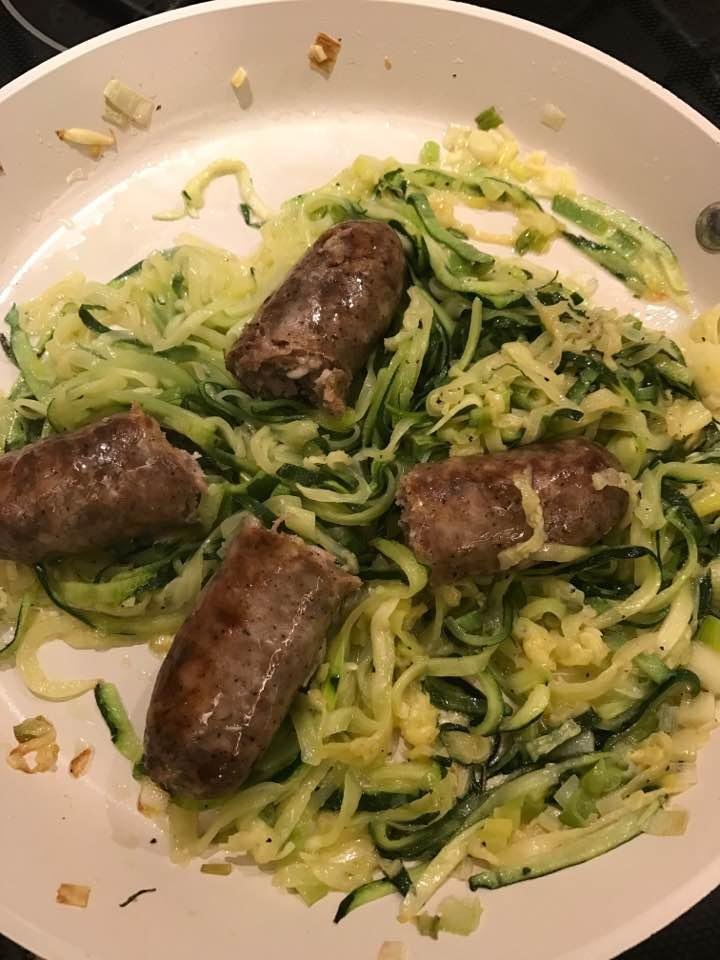 Making lunch for my bride! Polish sausage, zucchini and onions! Looking good!