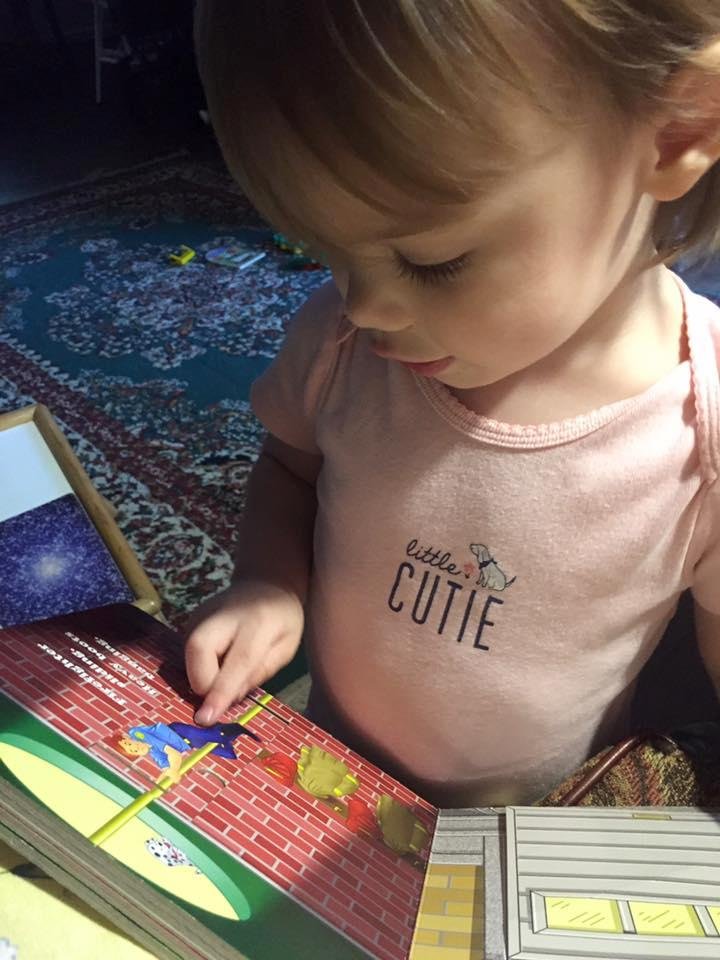 Laura has found some of the children's books.  She says this is Daddy at work!