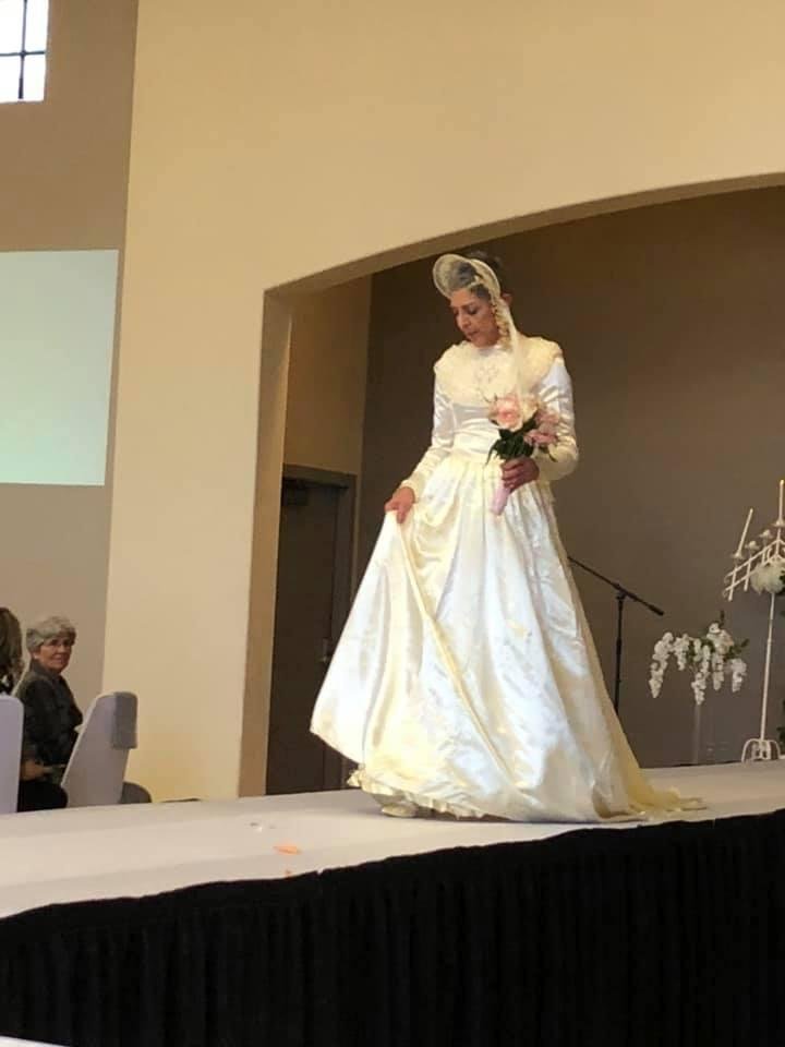 Modeling Mom's dress is friend and fellow parishioner, Gigi Pappas Medan