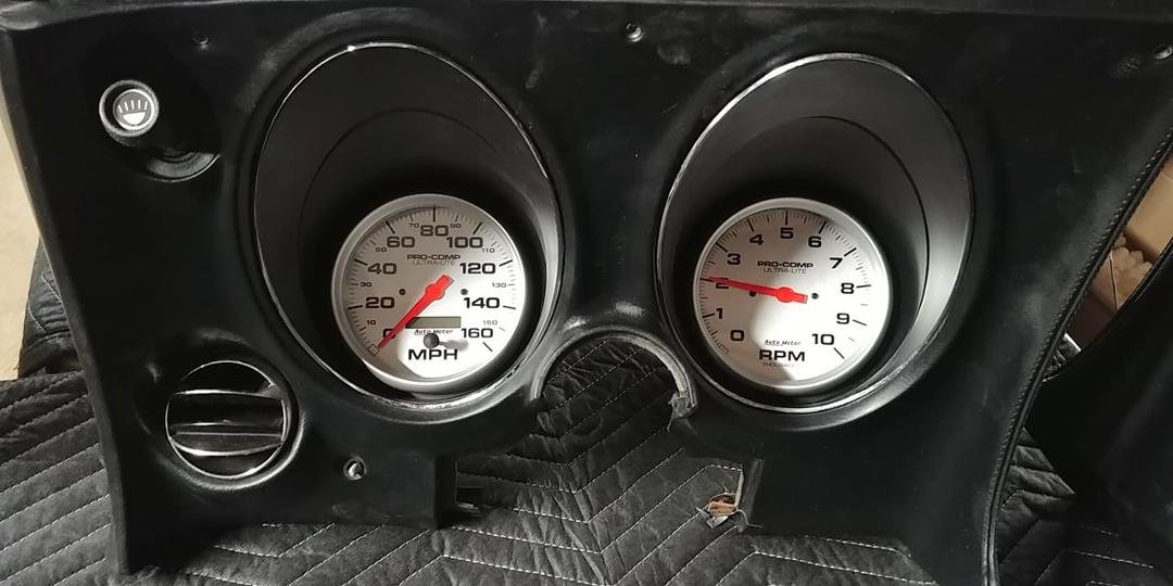 Tachometer and Speedometer gauges are installed in the lower left dash now.
