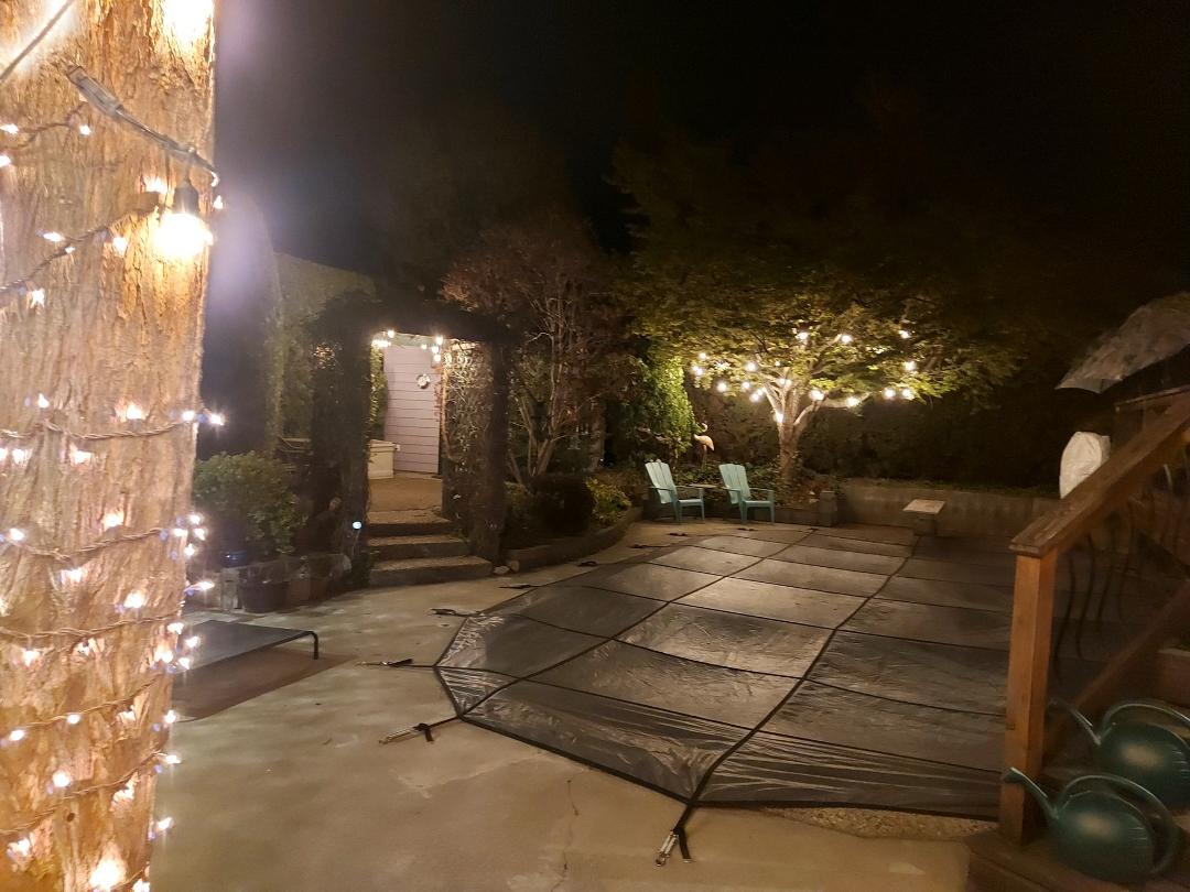 Backyard lighting in place opening the pool next