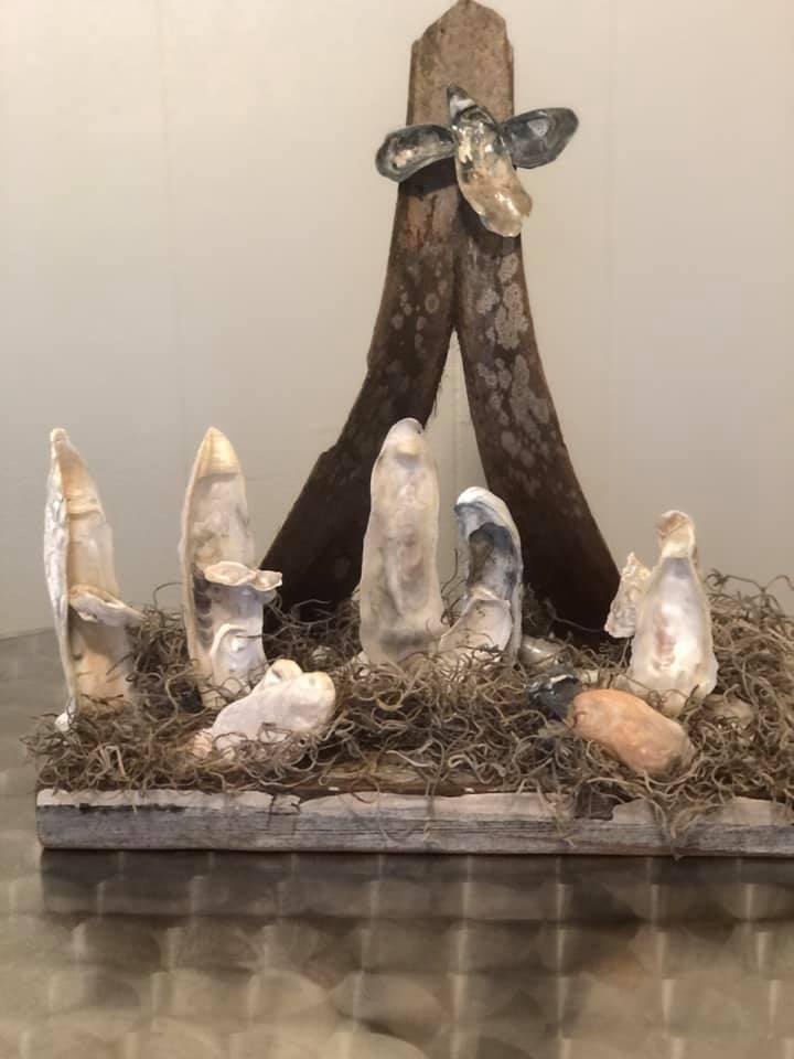 Wishing everyone all the Blessings of Christmas. Peace, Joy and Happiness for the coming year .
This is a Nativity scene made by my daughter Deborah Smith Reeves. She used Oyster shells and Palm fronds from Fripp island .