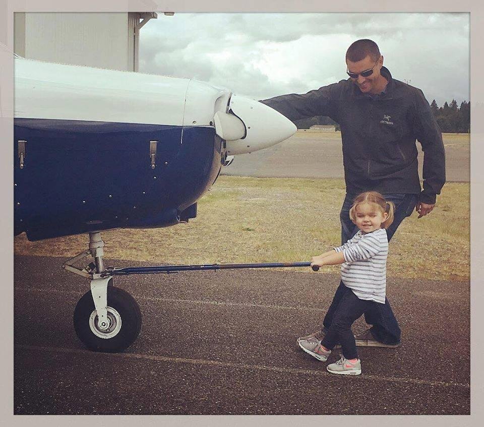 Daddy & Audrey going flying.  Paying dues!