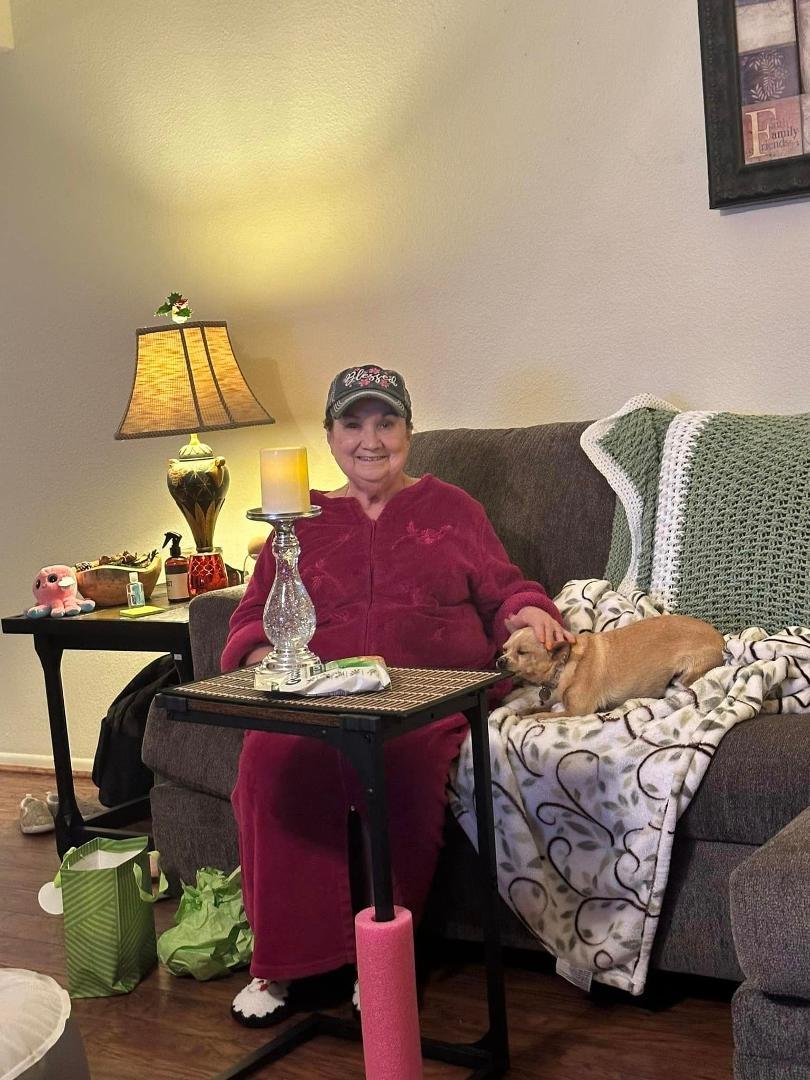 Me and Mamasita opening presents at my house. The candle holder and candle were a present from Loy, Nancy and the kids.