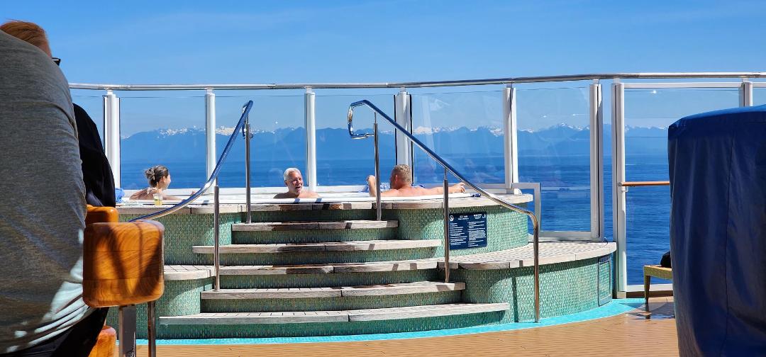 Oh the irony! 6 days of frigid temps and near constant rain and here on our last day, gorgeous sunshine, blue skies, and warm enough to be in the pool and/or hot tub with Alaskan snow capped mountains on the horizon.
Stil