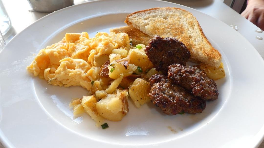 Sausage and two egg breakfast. All cured meats are made in-house.