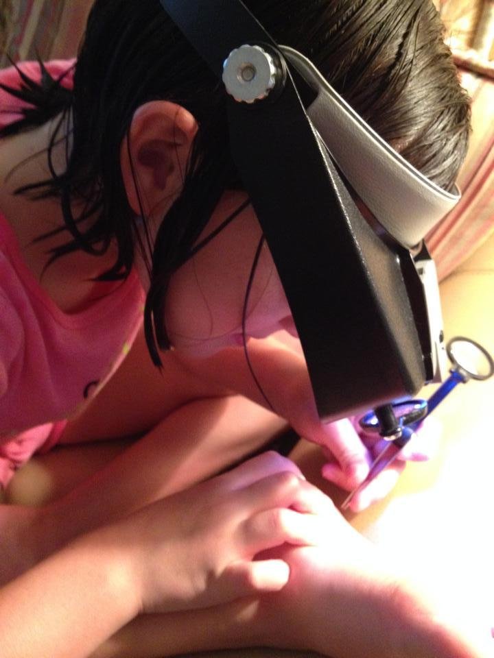 When Papa couldn't see the sticker in Grand-daughter Tessa's foot she said,"oh, give me that thing!" Took her about 15 seconds.