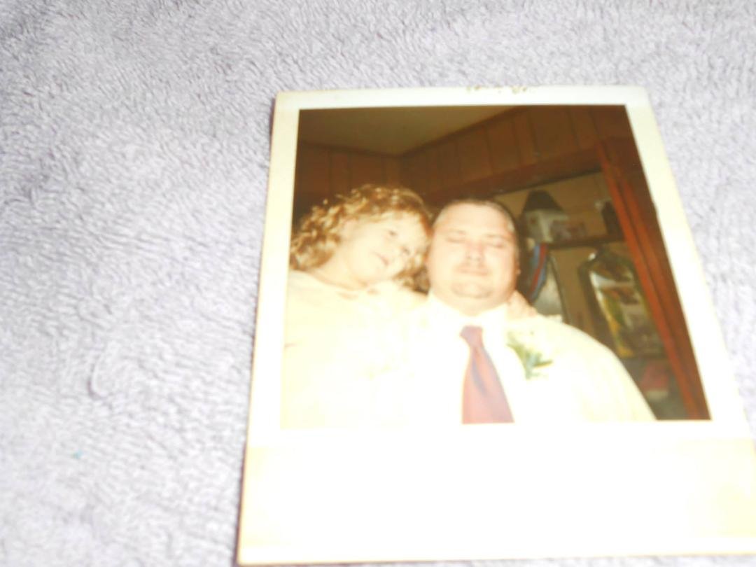 Taylor & Daddy just before The Daddy/Daughter Dance. I think she was appx. 5,maybe 6 yrs. old.