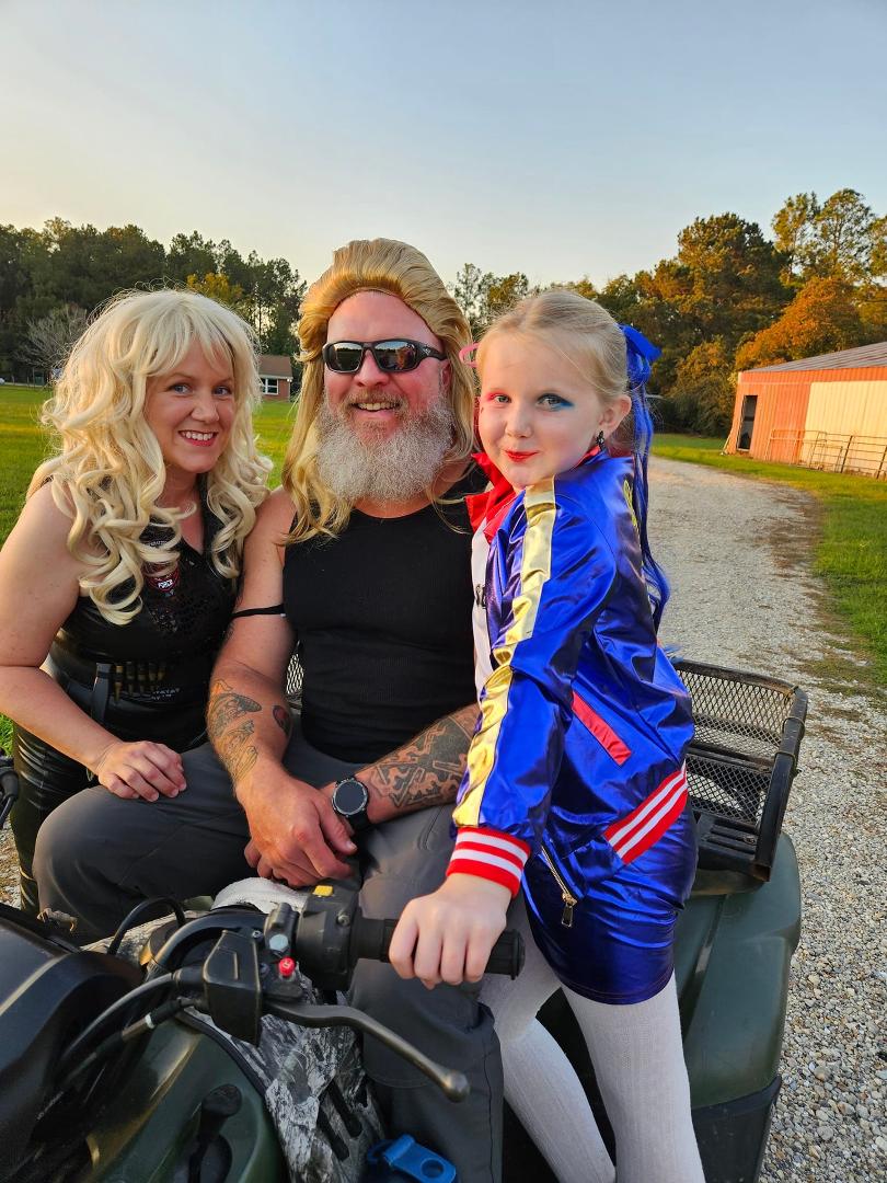 My crew dressed for the community Halloween celebration..
Dog- the Bounty Hunter
Beth - his wife
Harlequin
Must have been over 100 kids!! Awesome!!