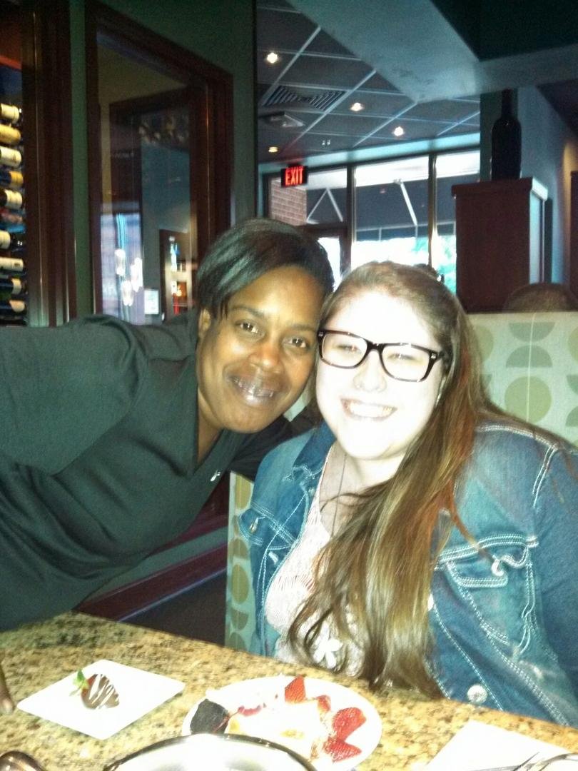 Devon finishing her fondue meal at the Melting Pot. We had so much fun and the food was delicious. This picture includes our waitress with Devon. She was so nice and funny. Happy 21st BD Devon.