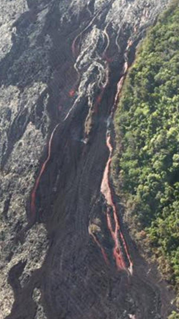 This was taken on the helicopter ride. It is lava running down the hill. AWESOME