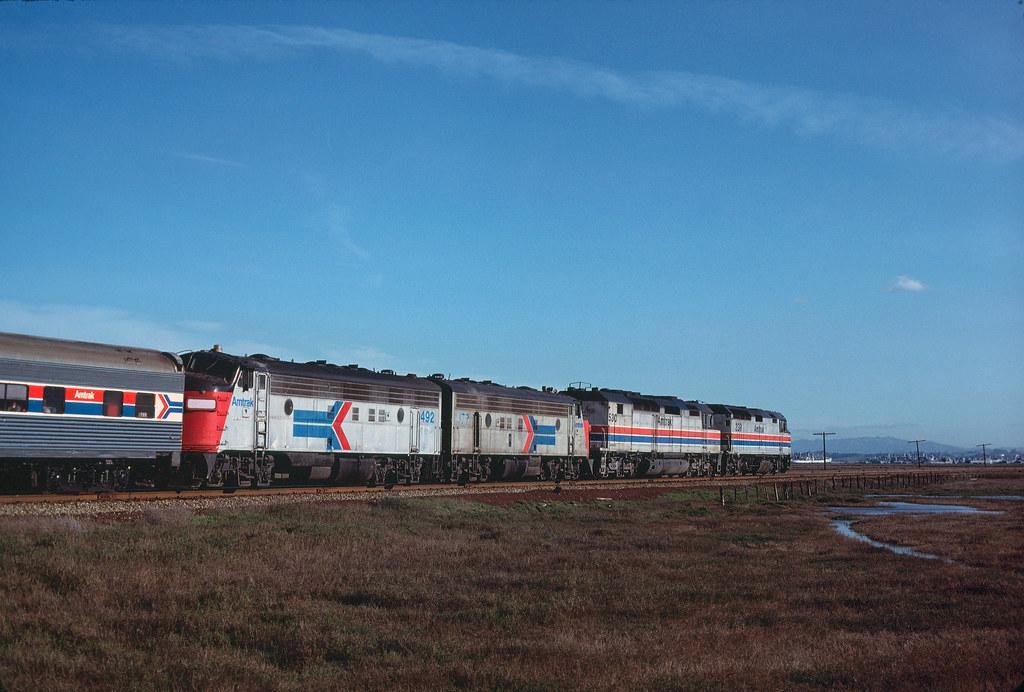 It was March of 1979 as The Reno Fun Train as the westbound passed thru Bahia with an assortment of EMD products as motive power. An F40, an SDP40F, and two ex-SP FP7's, all of which have since been converted to Rice Rocket