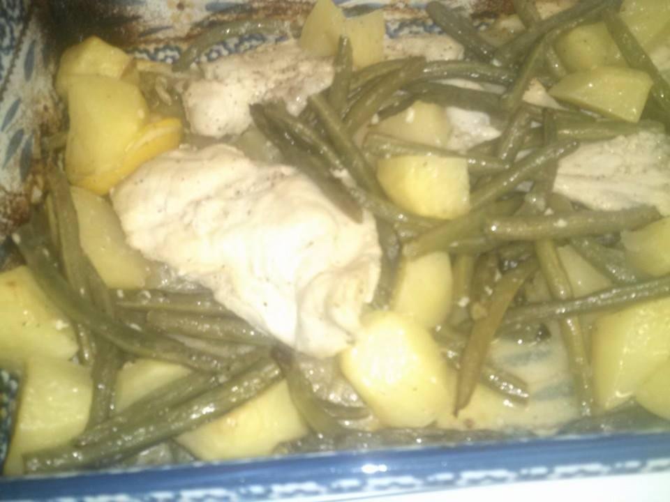 Chicken breast with fresh green beans and potatoes in lemon, lemon juice and minced garlic