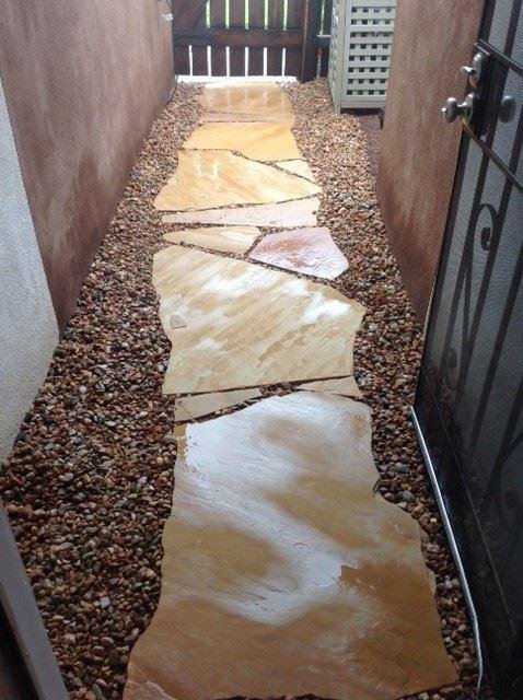 Now qualified to wrangle 110# slabs of flagstone.
