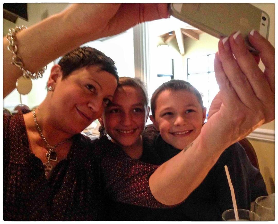 I was going to say that this was a selfie of a selfie, but not quite.