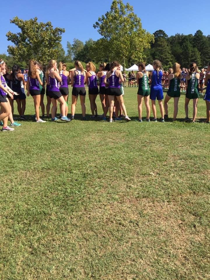 Praying before their run in Russellville Ark