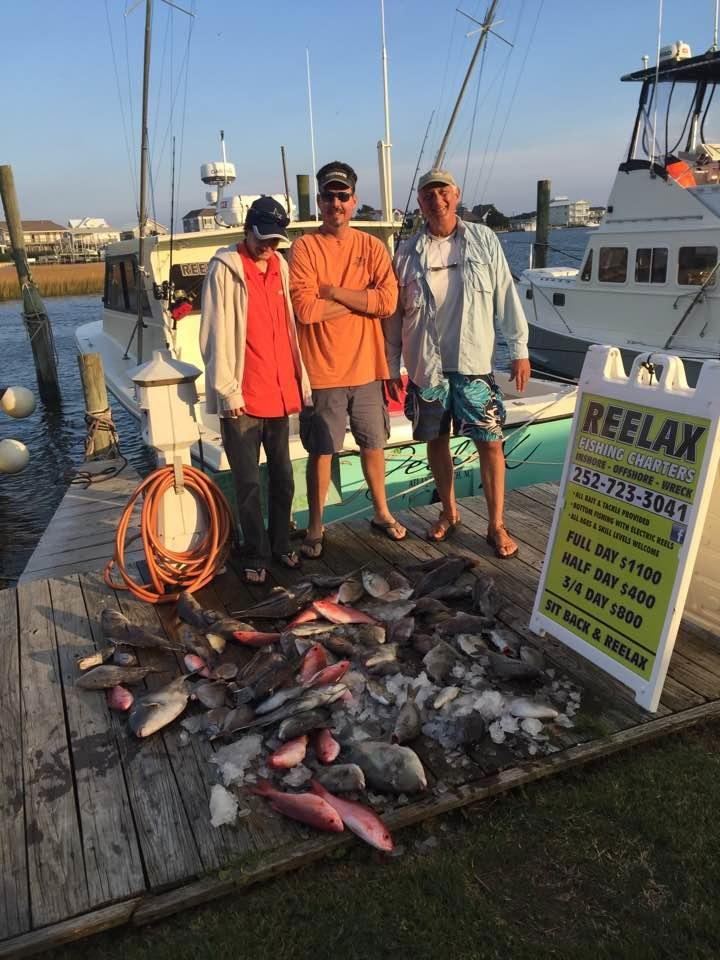Beautiful day fishing out of Atlantic Beach NC. Lots of Trigger Fish & Black Bass.