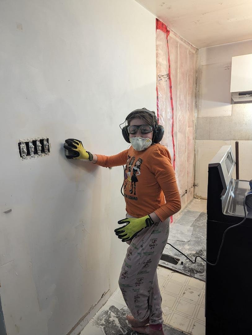 Emily the drywall apprentice sander