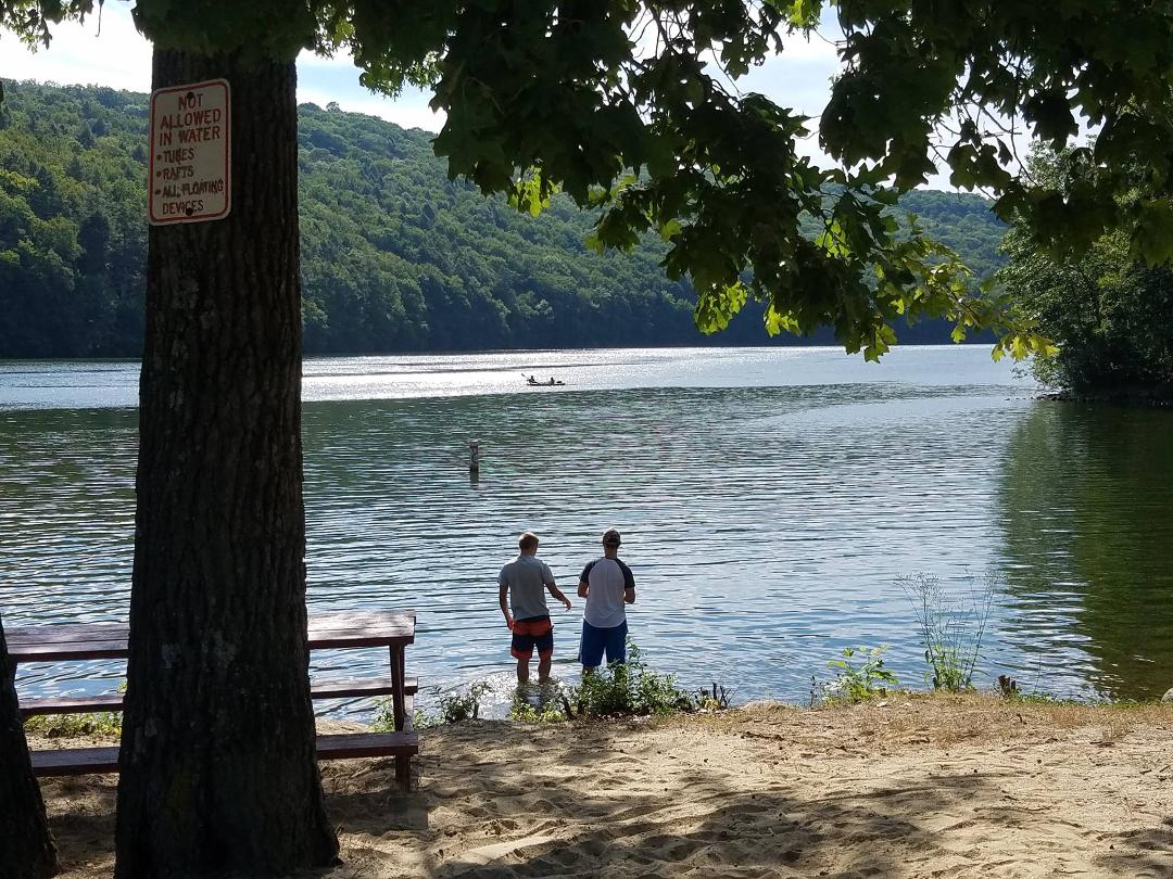 Jack on the left fishing with a friend