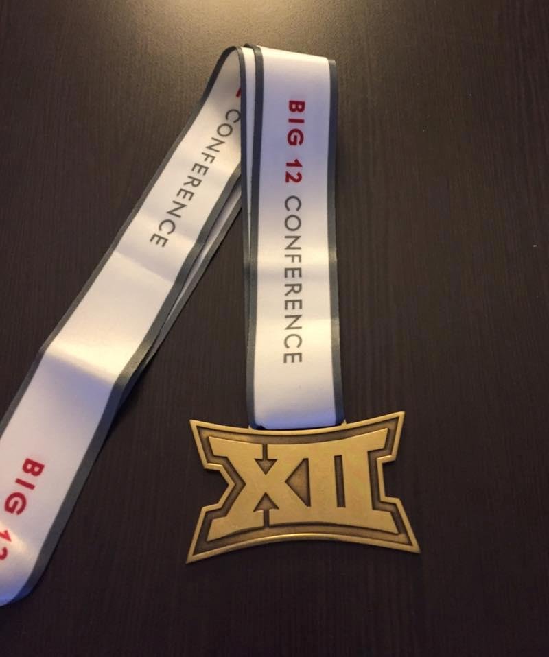 At the Big 12 Swimming and Diving Championship in Austin TX. Garrett swam anchor on the 200 medley relay last night. Swimming 50 free in 19.56.