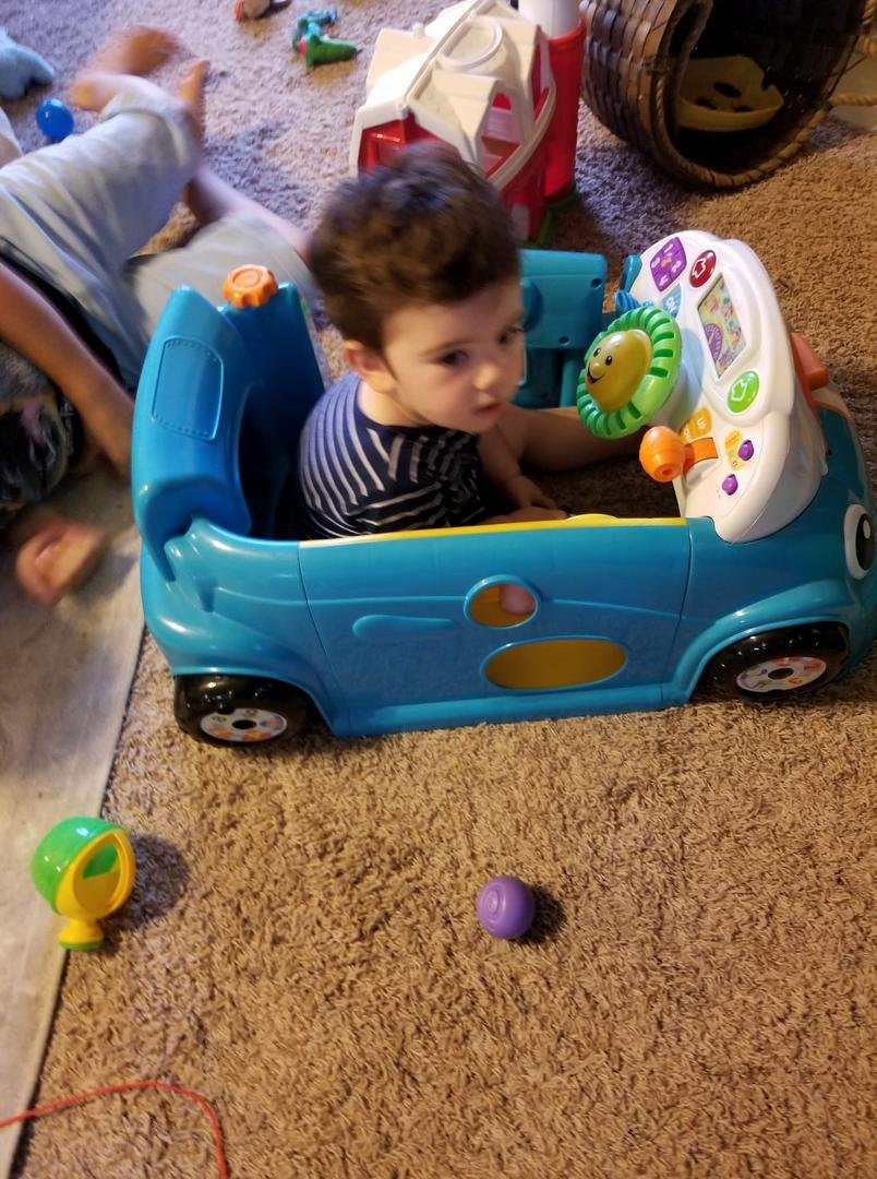 My great grandson "Ace" going for a ride!