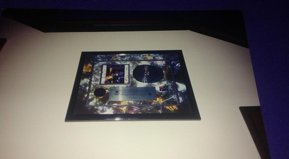 Purple Rain platinum album on the wall at Paisley Park Studios