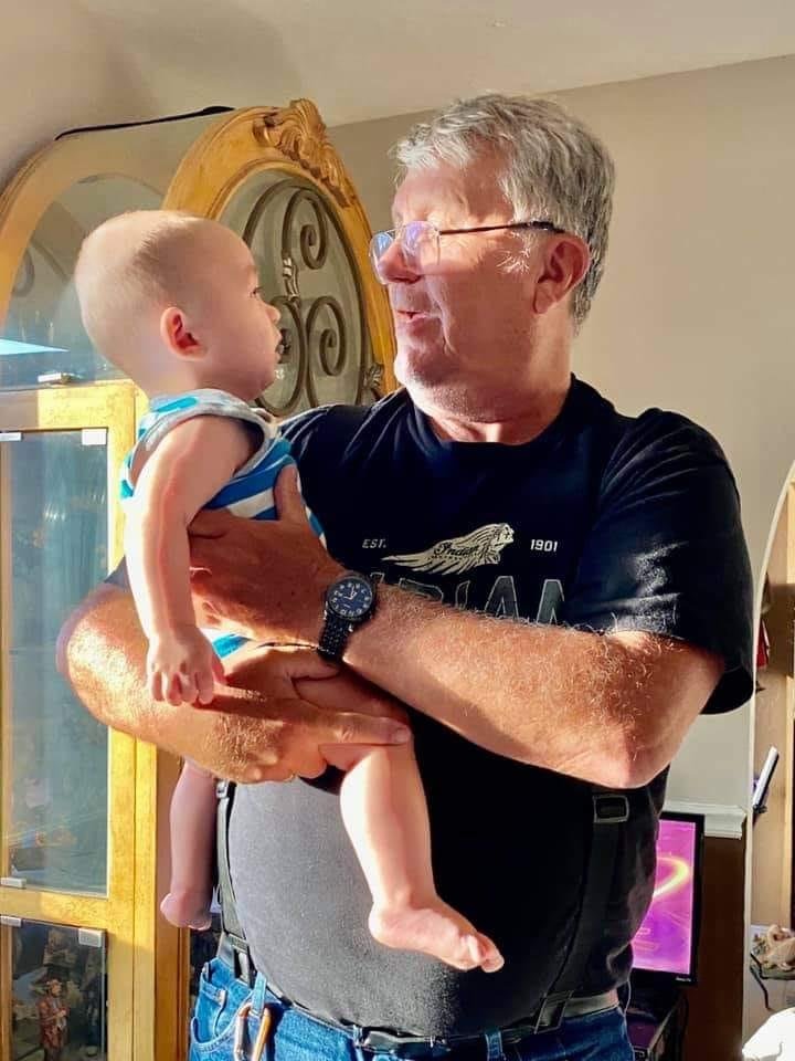 And he says, "Who are you?".  My newest grandson, Henry Leighton Fox.