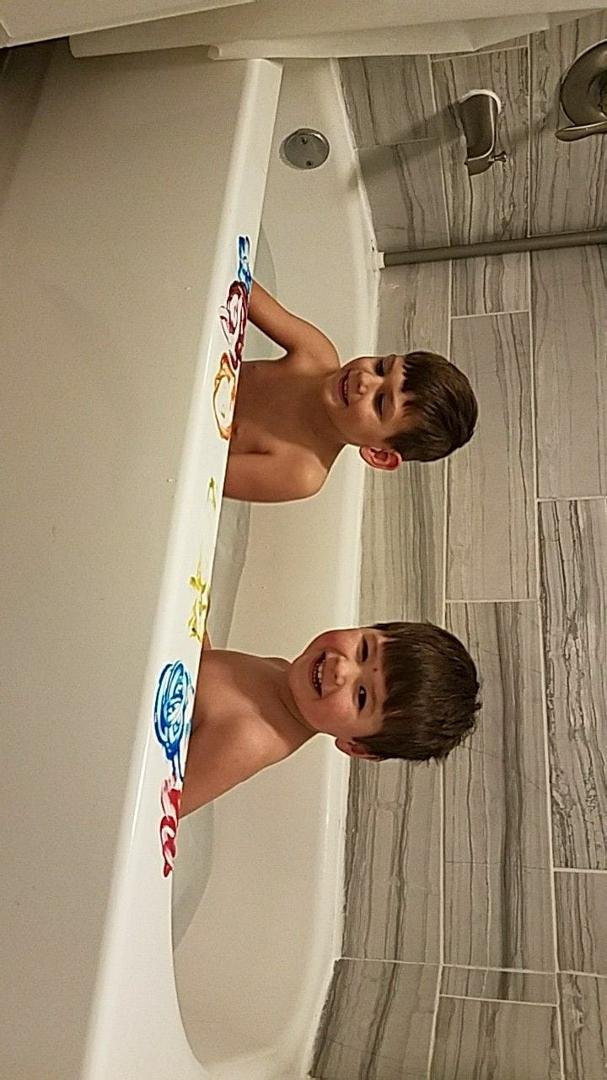 Finger printing in the bathtub! (It's colored soap!)