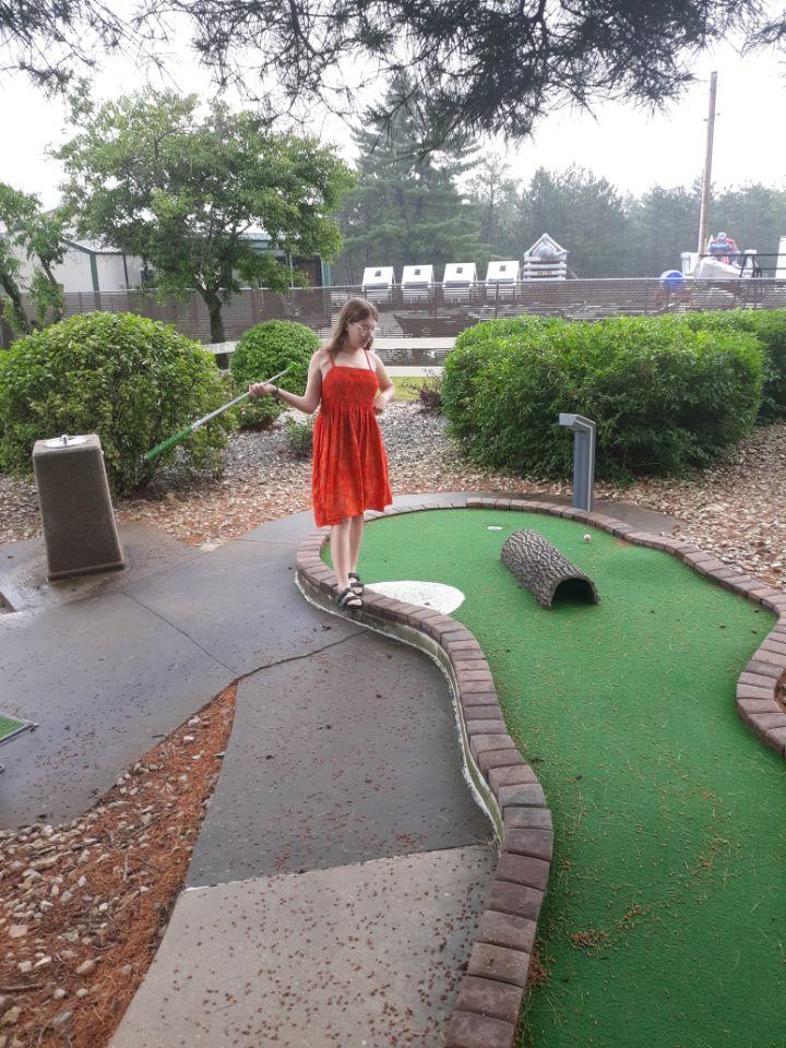 Getting a look at the slope before a putt