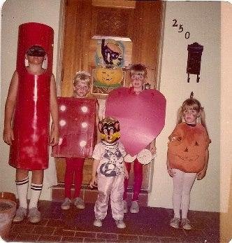 Going through some old photos and found this one.....taken in 1977....homemade Halloween costumes except for the little one....that was a hand-me-down from a friend.  Red cylinder was a fire cracker...others are self explan