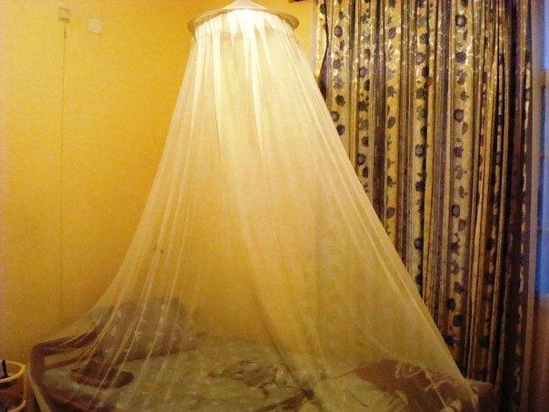We had to sleep under these nets to keep the mosquitos from biting. Malaria was always a danger.