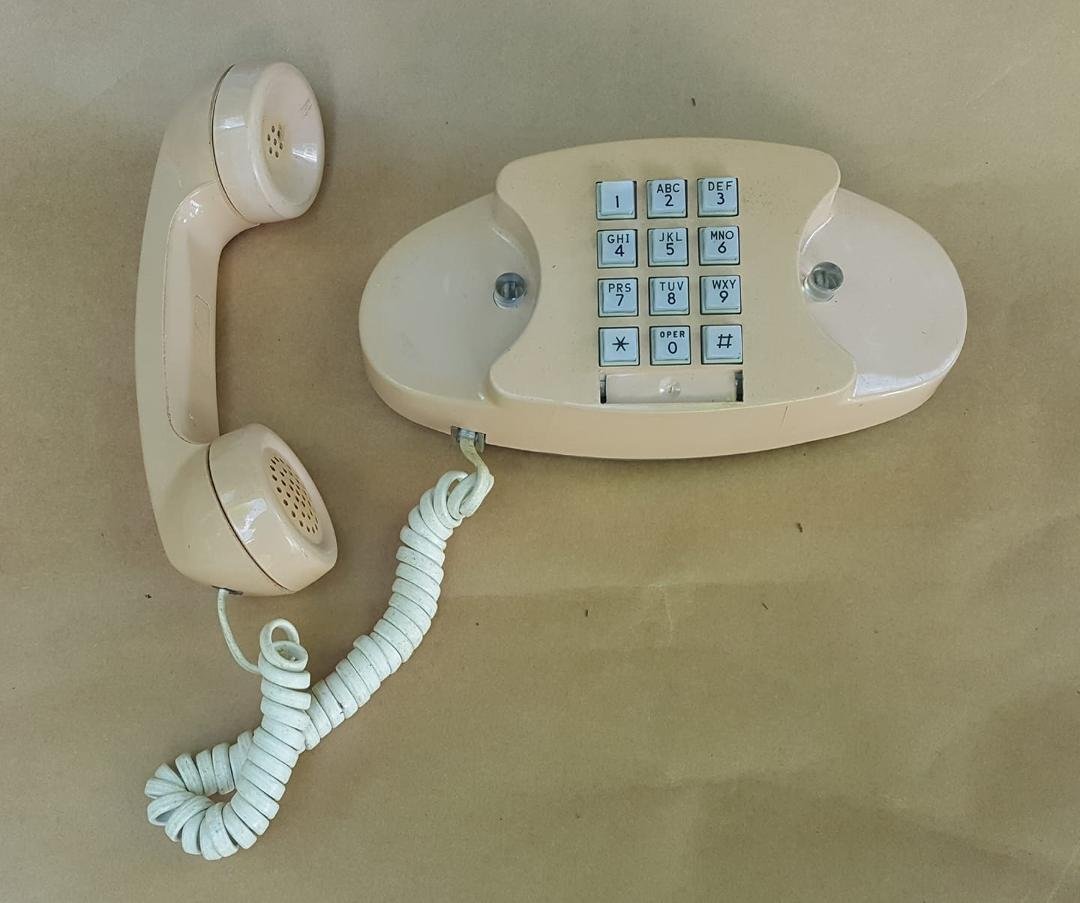 Princess phone, touch-tone dial.