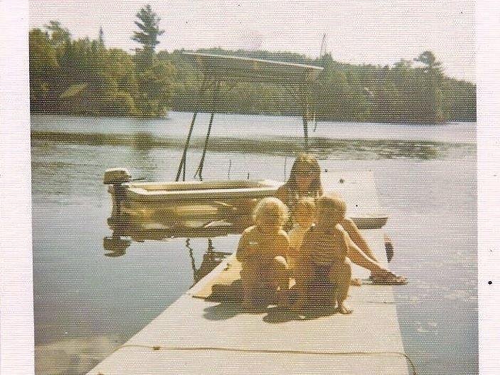 This picture was taken 1971 ? on the dock at camp (Chateaugay Lake). Tammy, Jimmy, Cheryl in front of me (Linda).
