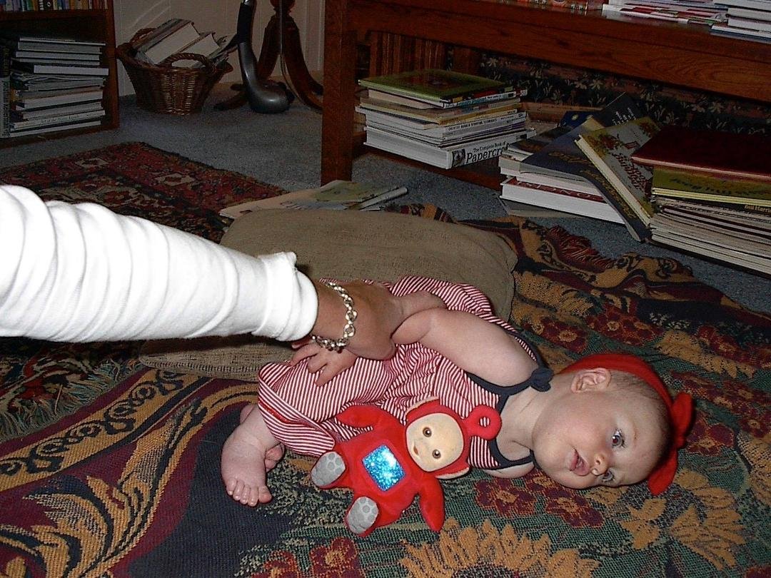 HAPPY BIRTHDAY BELLA! My favorite picture of all. Learning to sit up and tipping over like a little doll. love from Nana