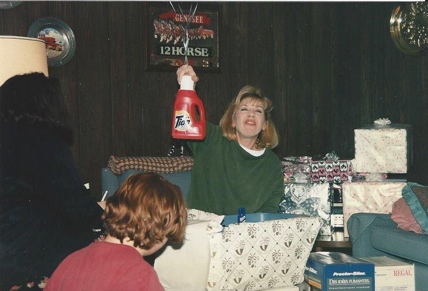 Only people who didn't do laundry can look so exaulted in holding laundry detergent...