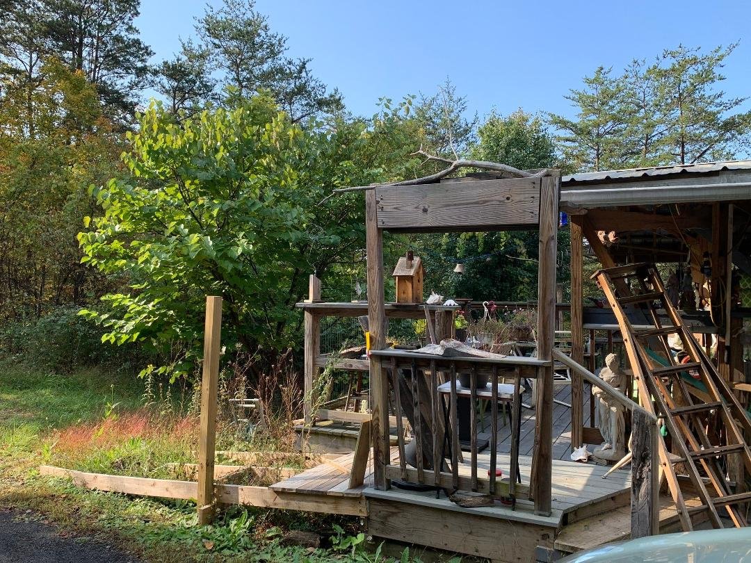 2022 late summer front deck with wip handieCapp ramp and fruit tree picking ladder