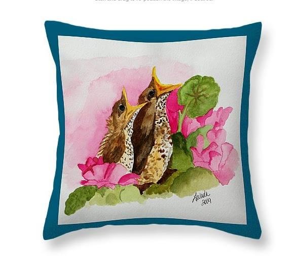 This is a photo of a pillow our daughter Vada Taylor gave to one of her “other” moms, Arvy Tasa, as a gift.  It is from one of her water color paintings.  Painting is only one of the many of her talents. Vada is currently r