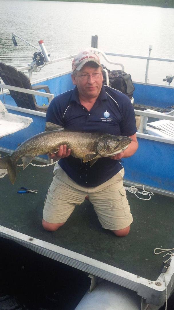 This old guy can still catch fish! Lake Trout 14 lbs 5 Oz. 35 inches long and released it to live a longer life! I believe it's about 35 years old now.