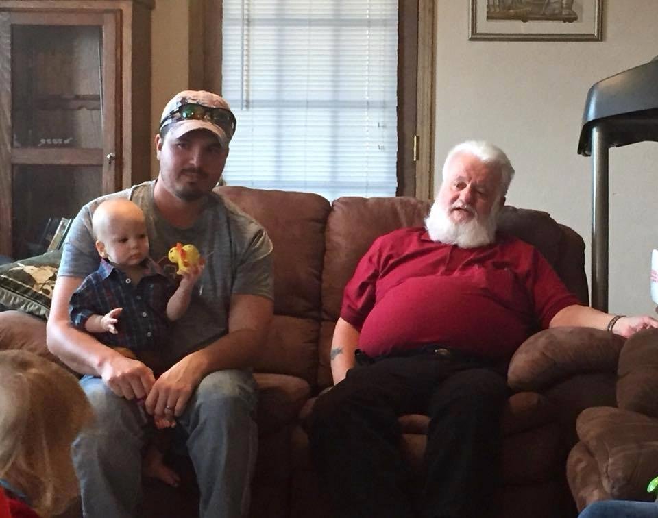 At son Brent's house on Christmas 2017 with grandson Jared and great-grandson Gauge.