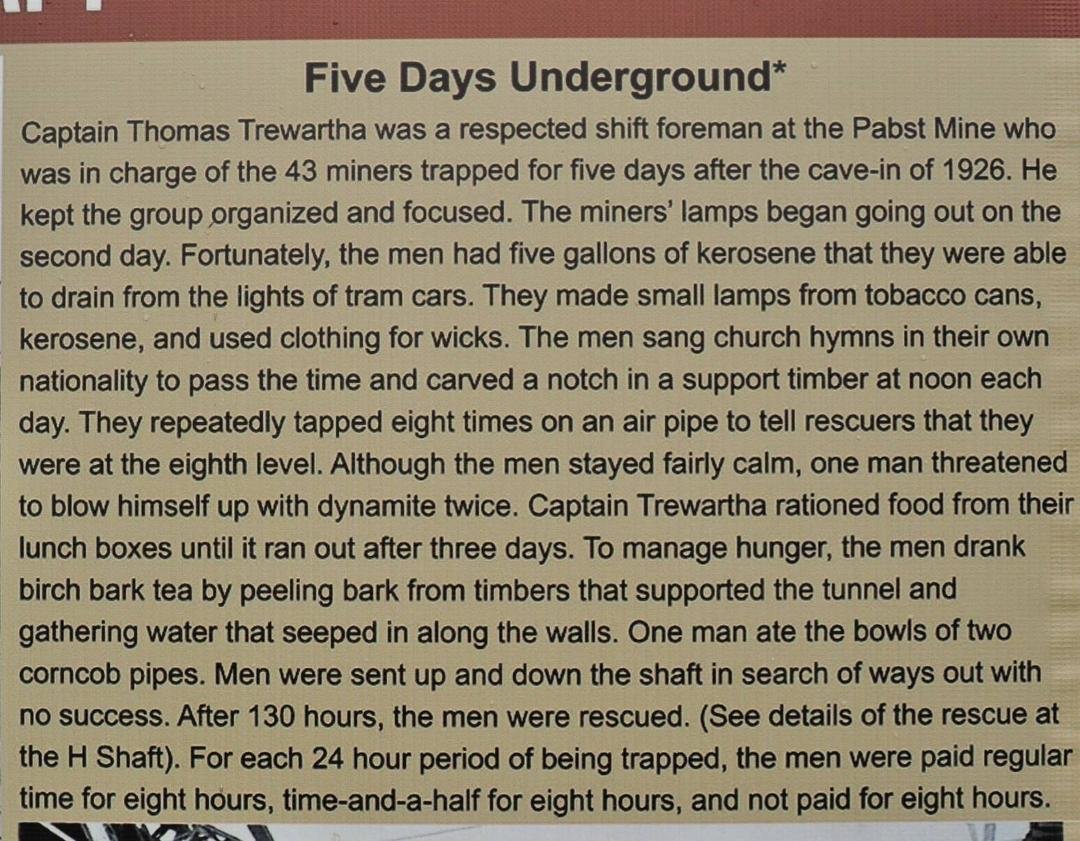 Read last sentence of plaque describing mine disaster in Northern Michigan