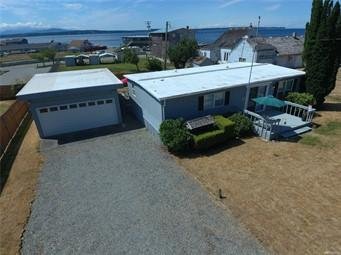 Whidbey Island cabin across from boat launch. Call your agent and go see. Bush Point Freeland