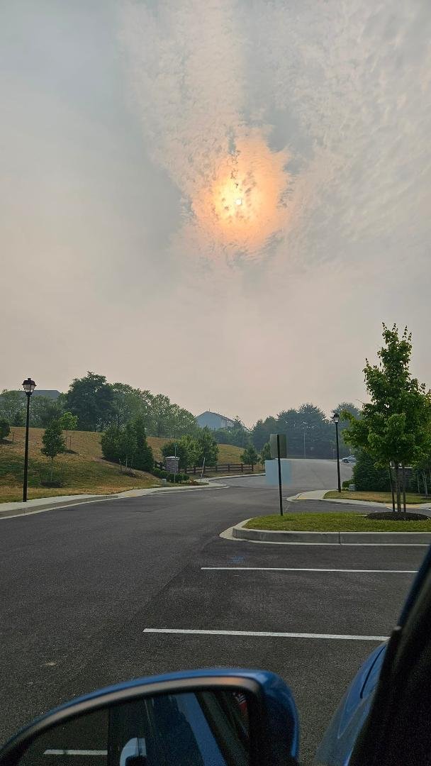 Thursday morning sun. The air quality is bad enough that outdoor activities have been canceled. We have been told to keep windows and doors closed and not run air conditioning that brings outside air in. Everthing looks "or