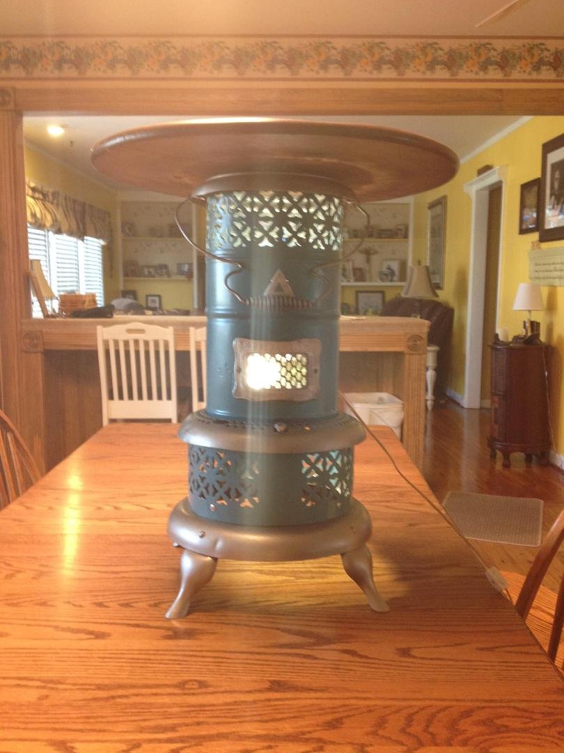 My second project complete, old kerosine heater restored with table top and night light.