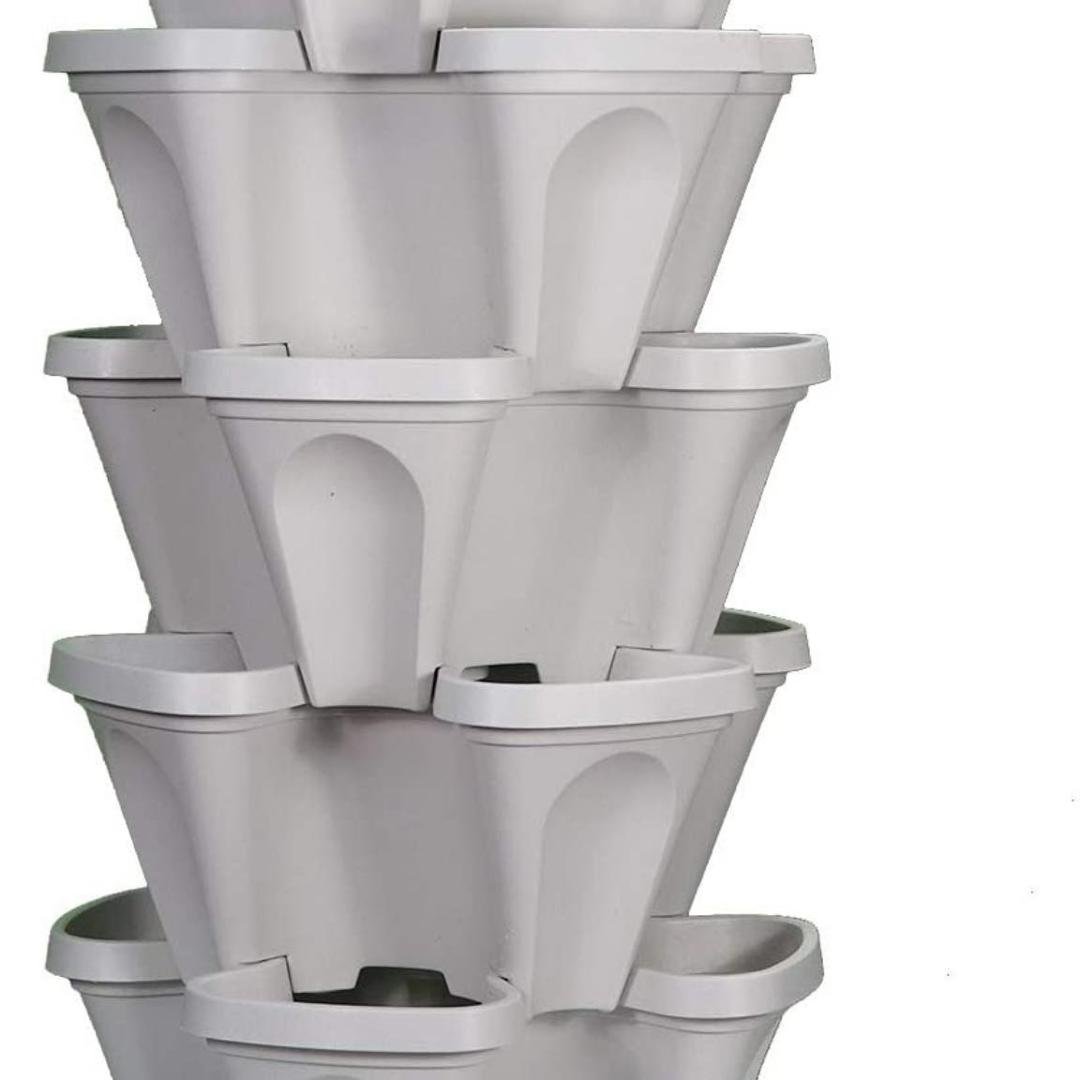 Just finished planting my 6 tier planter. Took 4 extremely large bags of dirt. 4 million (I swear it felt like it) seedlings and a very loving husband but it is done... we planted the bottom half yesterday and the seedli