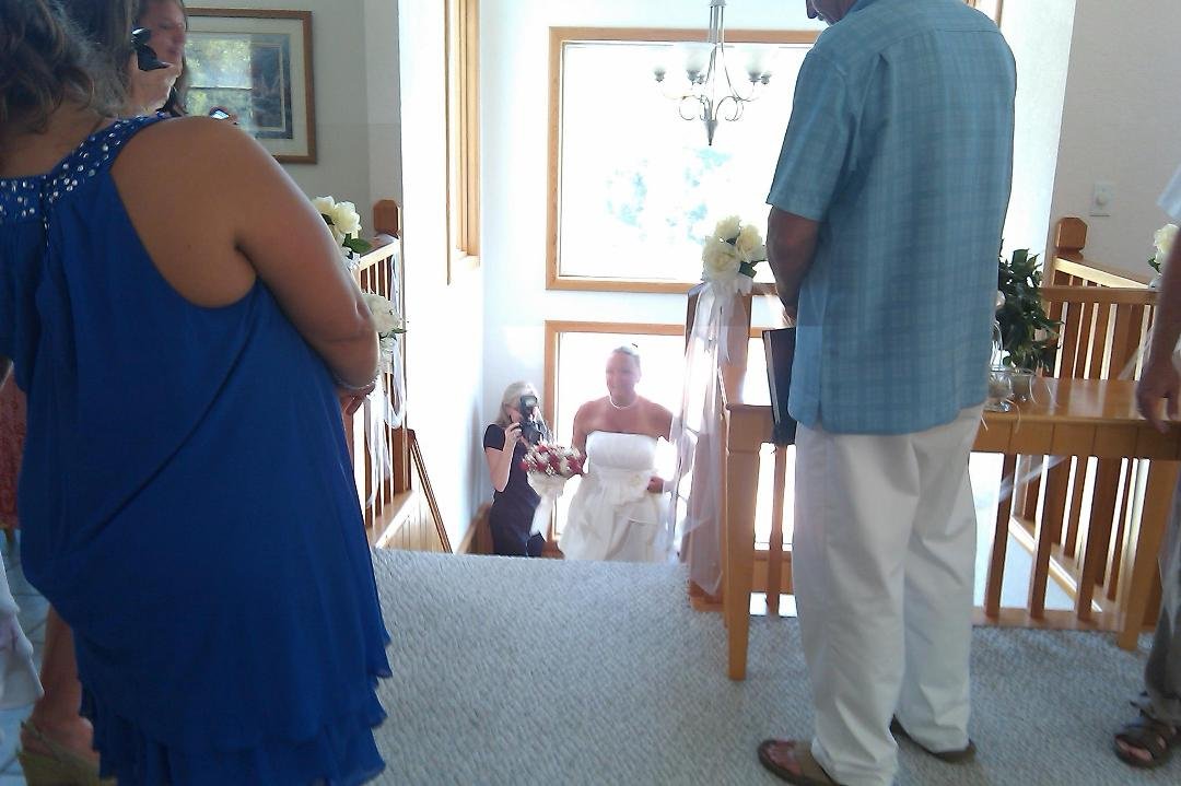 Amy coming up the stairs for wedding ceremony