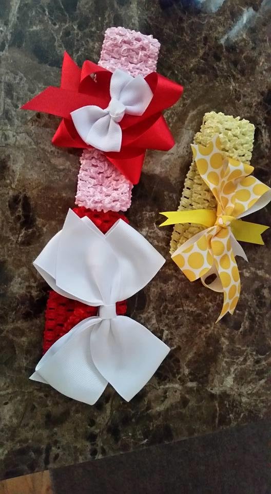 3 new Hairbows, 2 Spring and 1 Valentine. With bands $3 shipped. Let me know what size or age you need them for.