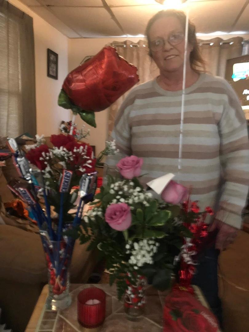 Our Valentinesday gifts to each other plus I fixed us a couple of strips and lobster tails bake potato Texas toast and a glass of wine sure was good!!!