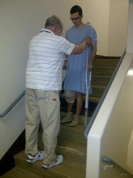 The stair master - Kyle....on crutches..