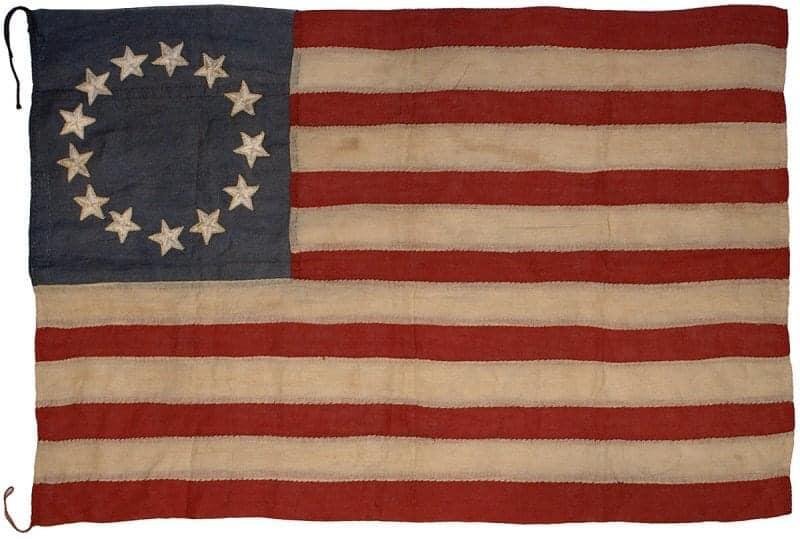 In May of 1776, Betsy Ross made the first American flag. On June 14, 1777, the Continental Congress created the Flag Act, which mandated that, “…the flag of the United States be made of thirteen stripes, alternate red and w
