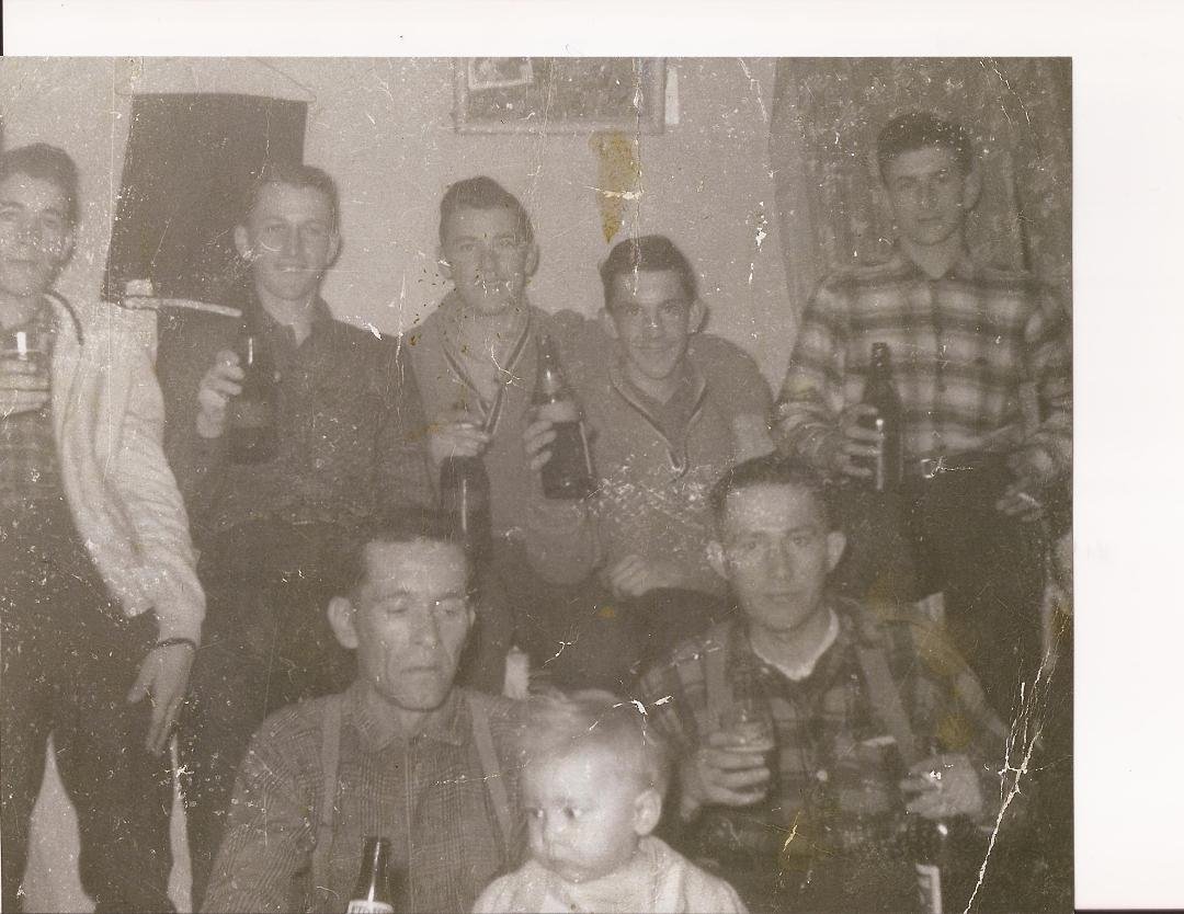 The fellow next to Uncle Clifford is Alphonse .(This photo is a good 57 to 58 years old , more than likely 58 . I believe Julien , the baby on here, is now
59 years old .)